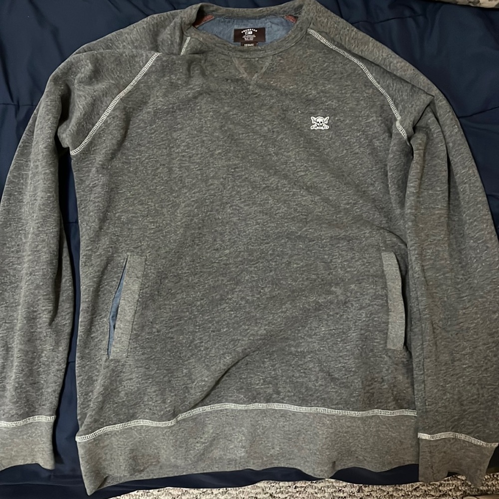 Four star crew neck sweater with handpockets